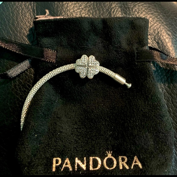 Pandora petals of love clear CZ clip charm.